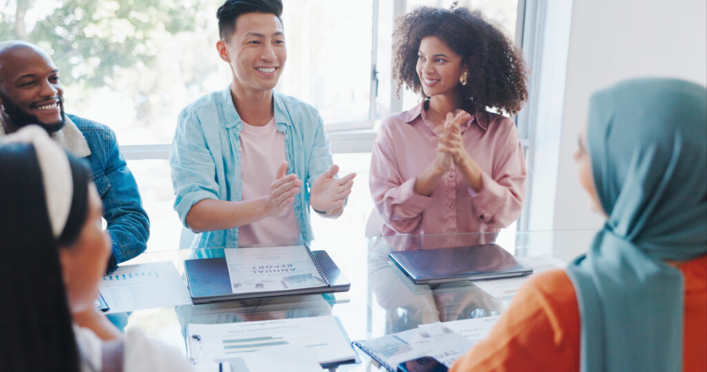 Young professionals discussing in a sales internship program.